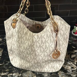 Michael Kors handbag! Good condition and a great travel bag. 12 x17 size